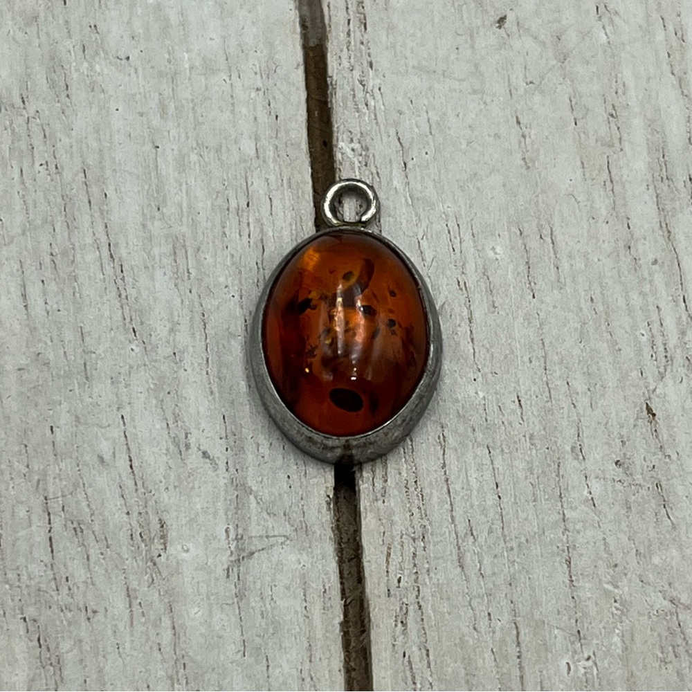 Elegant small sterling Silver Amber Pendant